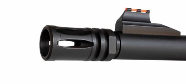 Red fiber optic sight on a rifle barrel with a flash hider