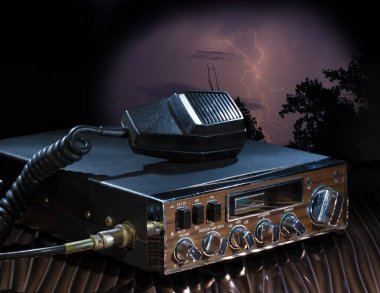 Emergency radio with lightning in the background