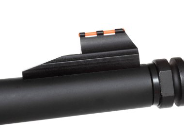 Red fiber optic sight up front on a rifle barrel isolated on white