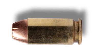 Yarı otomatik tabanca için oyuk uçlu mermilerin üzerine düşen gölge.