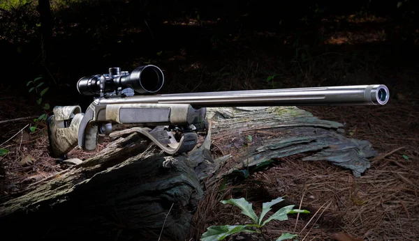 50 caliber muzzleloader with rifle scope set up for hunting
