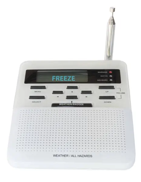 stock image High tech weather radio that has sounded an alarm and it now showing a freeze warning for the immediate area. 