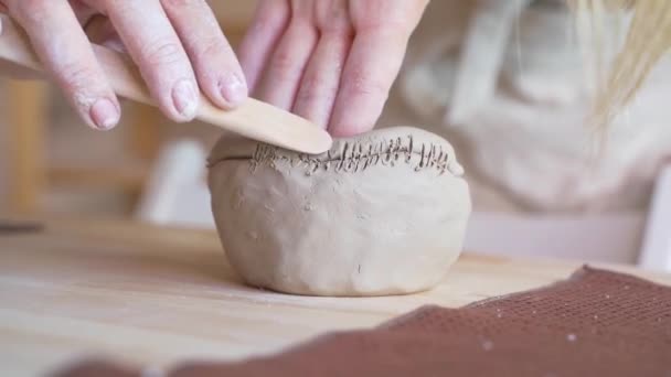 Craftsperson Applying Texture Clay Bowl Wooden Rib — Stock Video