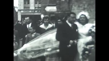 palermo, italy december 1940: the couple and guests go to the restaurant in black and white in the 1940s