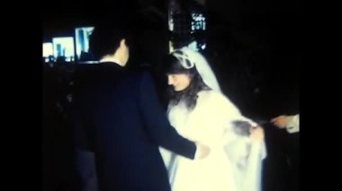 palermo,italy december 1980: Newlyweds dance at the restaurant in the 80s