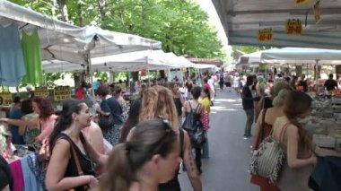 terni, italy july 19 2023: video footage of people at the market shopping from street vendors