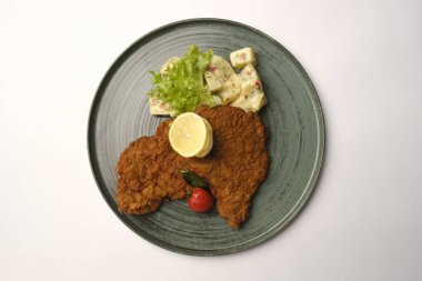 Tabakta domuz şnitzel..