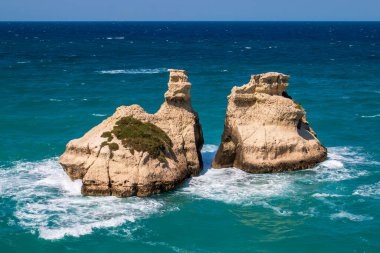 Cliffs and outcrops at Torre dell'Orso beach, Lecce, Italy. Outcrop of Le Due Sorelle in Italian which means the two sisters.