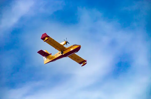 stock image Madrid, Espaa. 10 12 2019. Canadair CL-215T firefighting aircraft. Military and emergency service aircraft flying at the Columbus Day military parade in Madrid.