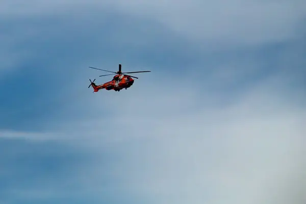 stock image Madrid, Spain.10 12 2019. Helimer 401 helicopter, model EC 225 for Maritime Rescue. Military and emergency services helicopters flying at the Columbus Day military parade in Madrid, Spain.