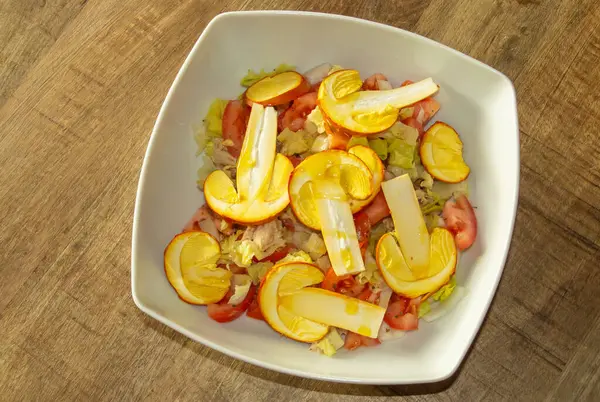 stock image Mediterranean salad with sliced and raw Amanita caesarea. Amanita caesarea, Caesar's mushroom, is a high quality raw edible mushroom.