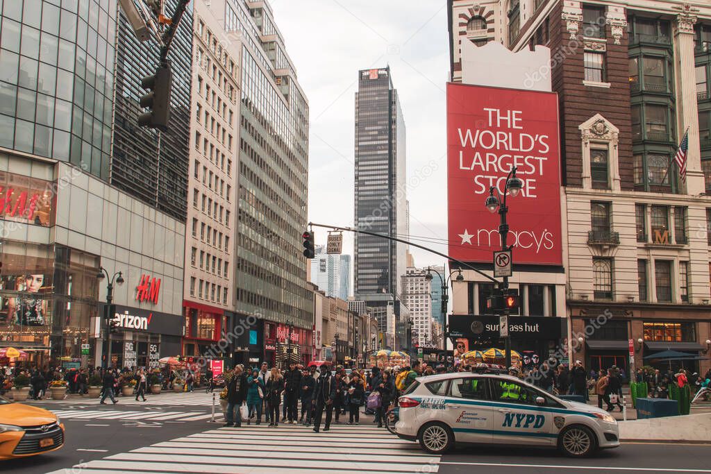 New York, USA. 11 10 2019. Cityscape of the streets of downtown Manhattan. One Penn Plaza skyscraper from the intersection of 6th Ave and W 34th St.