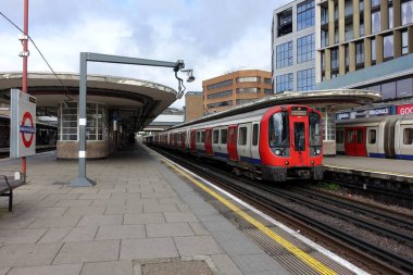 S8 Stock Metropolitan line train at Harrow on the Hill station clipart