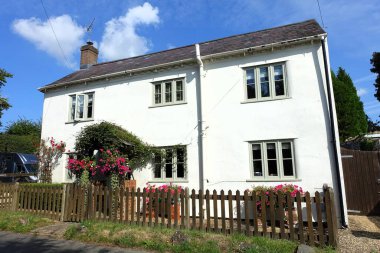 White painted cottage in Chesham Lane, Lee Gate, Buckinghamshire in the Chiltern Hills clipart