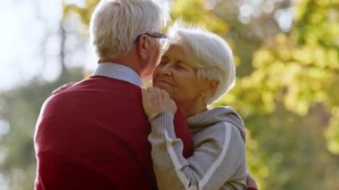 Retired grey-haired woman in love with her husband. High quality 4k footage