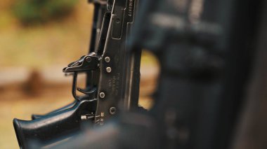 Closeup of a trigger of a gun. High quality 4k footage