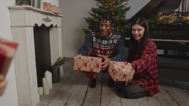 Multiracial Young Family Three Opening Christmas Presents High Quality Photo — Αρχείο Βίντεο