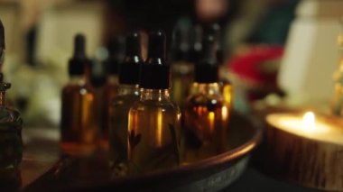 Aroma oils, perfumes in bottles at handicraft market. High quality 4k footage