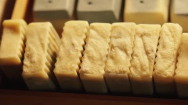 Bars of natural handmade soap in rows. High quality 4k footage