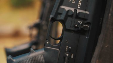 Display of triggers in the image. Safe way to use a rifle, accidents while playing with the trigger. High quality photo