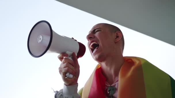 Gay Man Lgbt Flag His Shoulders Screaming Megaphone Closeup Shot — Stockvideo