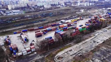 Aerial view of cargo containers on the railyard. Freight transport. Warsaw, Poland. High quality 4k footage