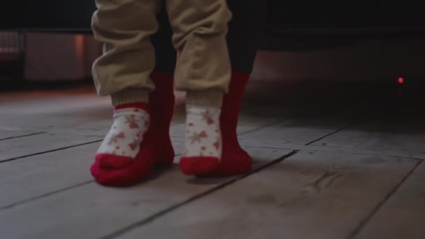 Little Kid Standing Fathers Feet Learning Walking Parents Kids Concept — Stock Video