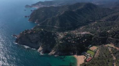blue water beach cove of the mediterranean sea, on the costa brava of spain In Cala Giverola
