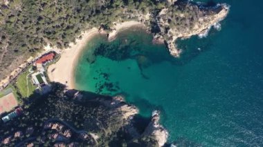 blue water beach cove of the mediterranean sea, on the costa brava of spain In Cala Giverola