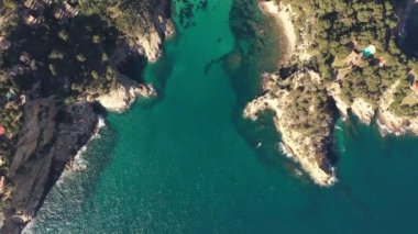 blue water beach cove of the mediterranean sea, on the costa brava of spain In Cala Giverola