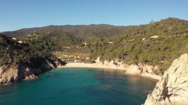 blue water beach cove of the mediterranean sea, on the costa brava of spain In Cala Giverola