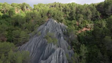 Rocks Blues and trees against the background of sunny day, Esparreguera, Spain