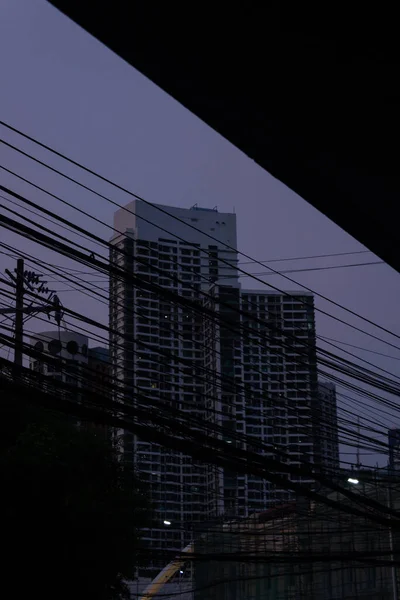 Apartment block with cable mess in downtown Manila