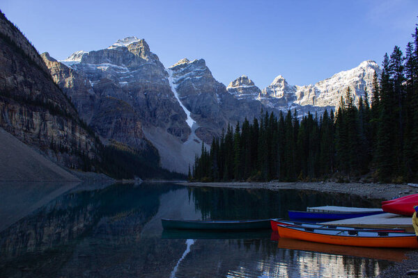 The famous boats waiting on Lake Moraine. In Canadian Rockies.