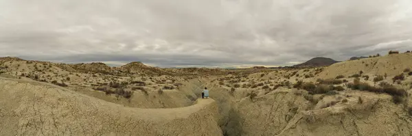 stock image defaultPanoramic aerial view of a man in the Abanilla desert or Mahoya desert in Murcia, Spain