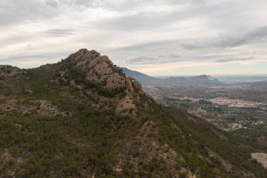 Aerial view of part of the Ricote Valley from the Ojos reservoir, with its orchard and palm trees, Region of Murcia, Spain clipart