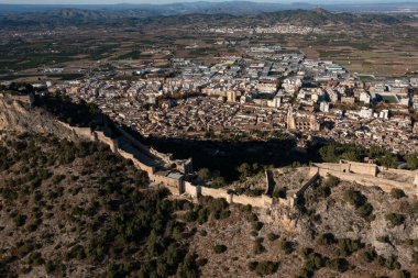 Aerial view of the castle of Xativa village in Valencia in Spain clipart