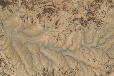 Aerial view of the incredible shapes of the arid lands of the Abanilla desert or Mahoya desert in Murcia, Spain clipart