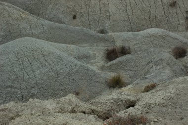 View of the incredible shapes of the arid lands of the Abanilla desert or Mahoya desert in Murcia, Spain clipart