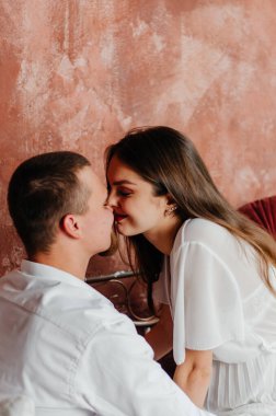 a girl and a boy are having fun