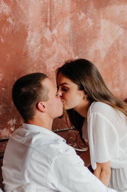 a girl and a boy are having fun