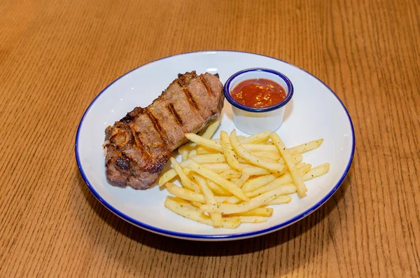 steak with fries and gravy