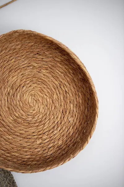 stock image a collection of woven baskets on a white surface