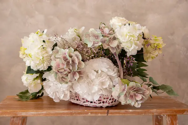 stock image a bouquet of different flowers on the table