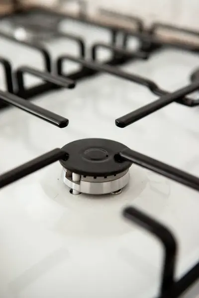 stock image kitchen stove with burners and regulating valve