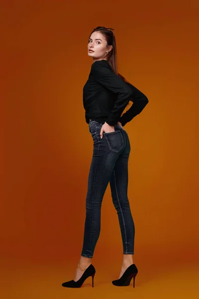 Full Body Woman Black Shirt Jeans Color Studio Background — Stock Photo, Image