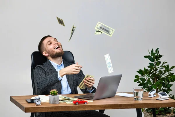 Young Bearded Businessman Working Laptop Throwing Money While Sitting Chair — Stock Photo, Image