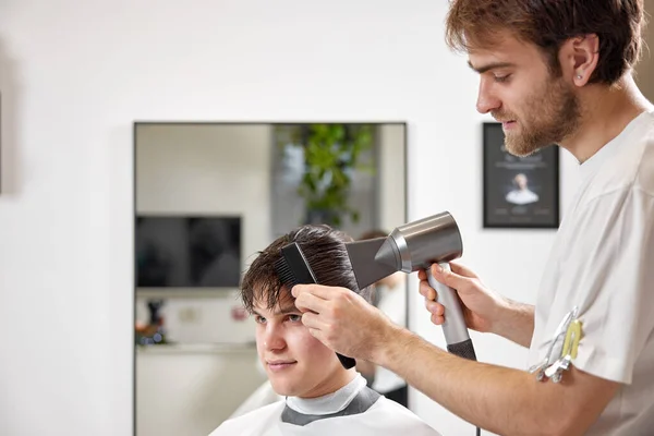 Professional Hairdresser Using Hair Dryer Comb Barber Shop Haircut Barbershop — Stock Photo, Image