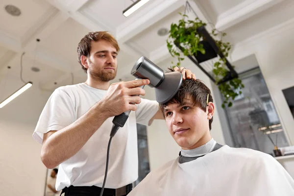 Professional Hairdresser Using Hair Dryer Hairbrush His Client Barber Shop — Stock Photo, Image