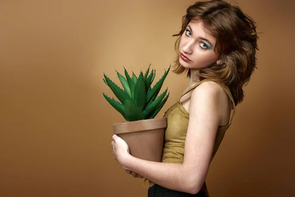 Young Woman Stylish Hairstyle Posing Plant Pot Beige Background Copy — Stock Photo, Image